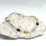 Blue Topaz, Peridot and Iolite facteted gemstones in 925 silver bezel setting bracelet PBGJ024