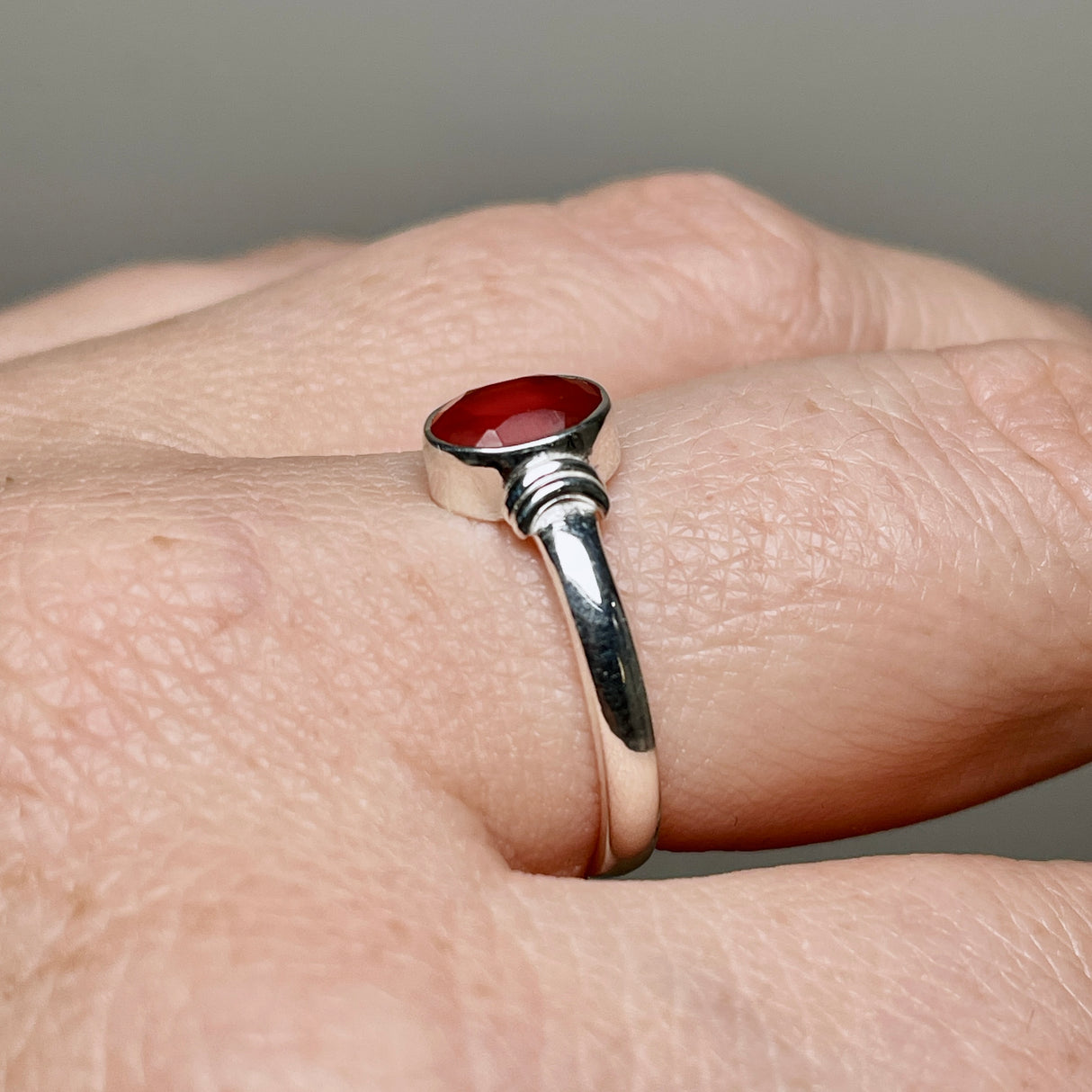 Carnelian Oval Faceted Stone in a Decorative Setting R4831
