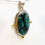 Emerald Oval Cabochon Pendant in a Decorative Setting KPGJ4638