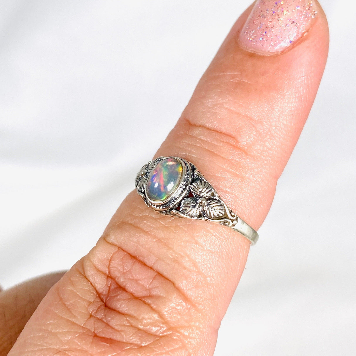 Ethiopian Opal ring with silver flower design in band KRGJ2999 - Nature's Magick