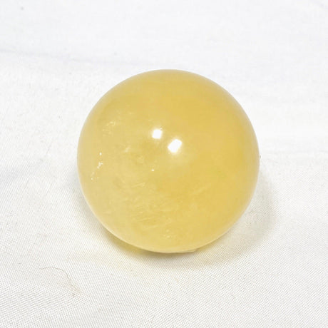 Honey Calcite Sphere 120-130g - Nature's Magick