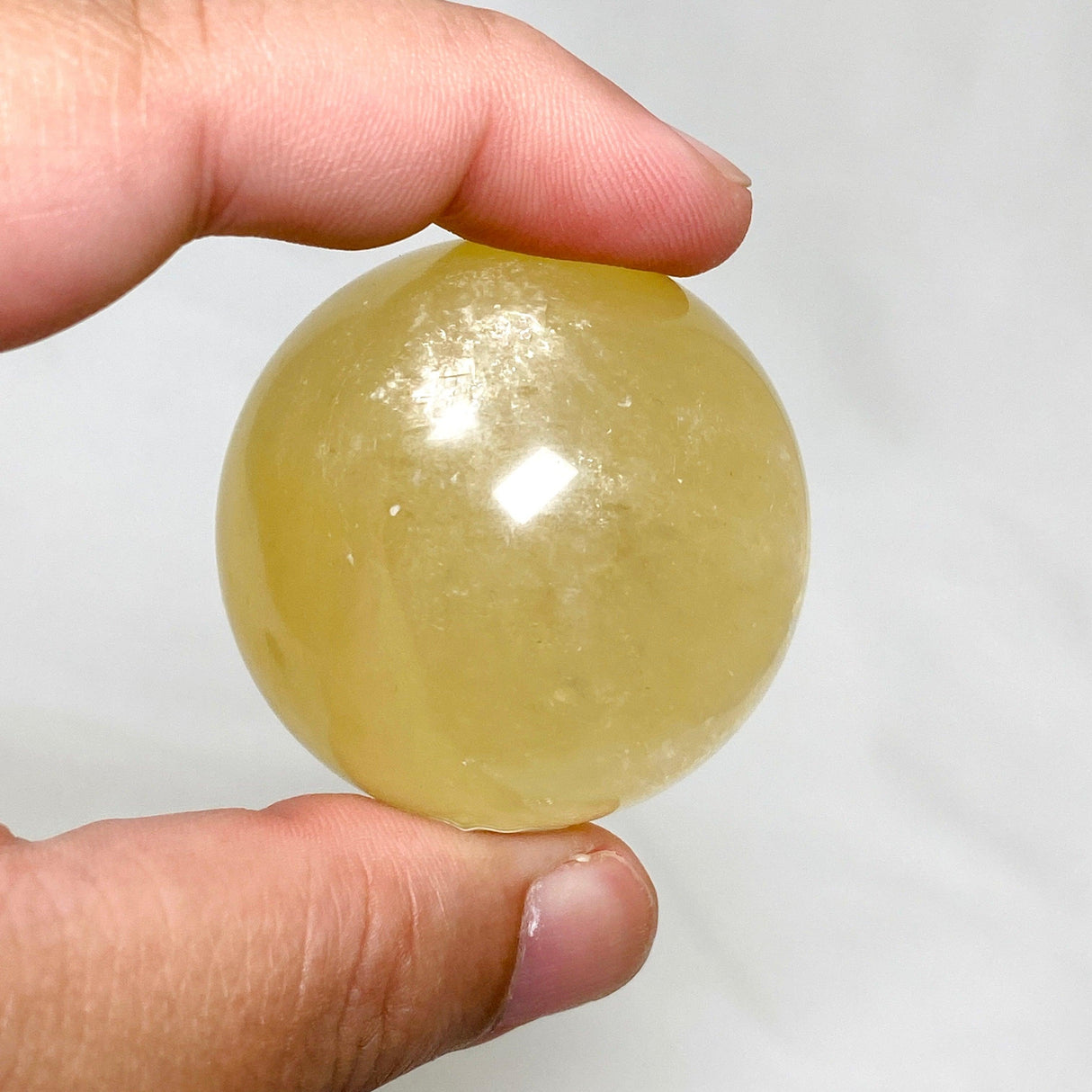 Honey Calcite Sphere 120-130g - Nature's Magick