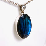 Blue iridescent Labradorite faceted gemstone and silver pendant on a chain