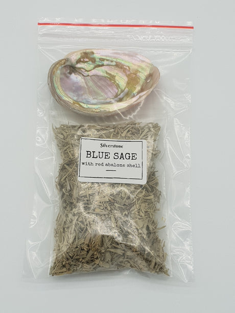 A clear plastic zip-top bag containing dried blue sage and a polished iridescent abalone shell, with a white label reading 'SILICONE BLUE SAGE with red abalone shell' on a light gray background.
