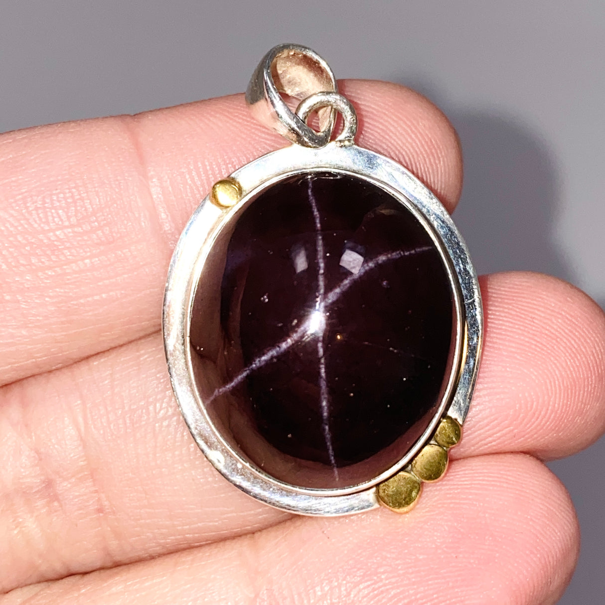 Star Garnet Oval Cabochon Pendant in a Decorative Setting KPGJ4848