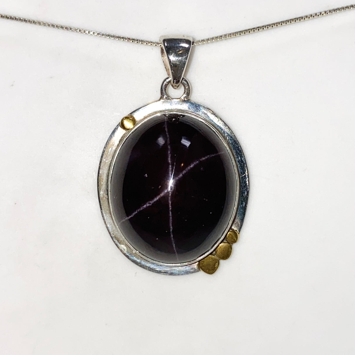 Star Garnet Oval Cabochon Pendant in a Decorative Setting KPGJ4848