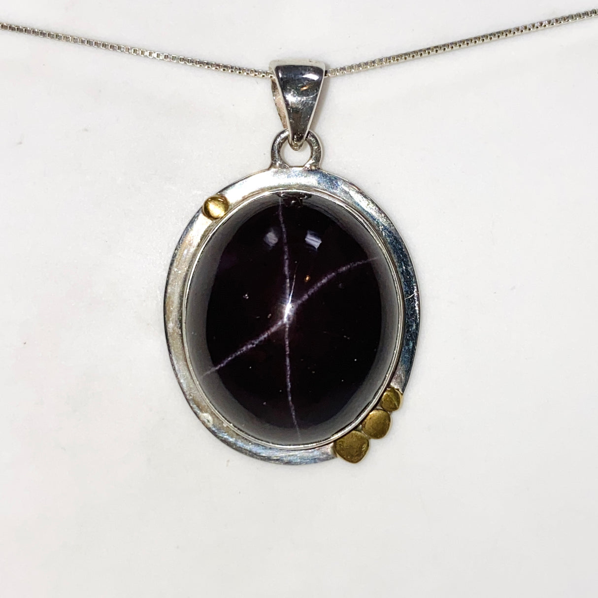 Star Garnet Oval Cabochon Pendant in a Decorative Setting KPGJ4848