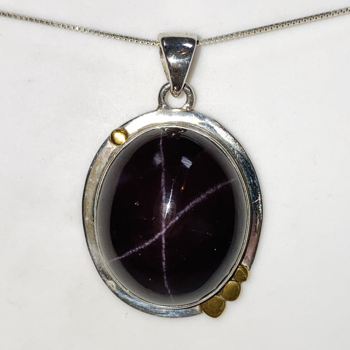 Star Garnet Oval Cabochon Pendant in a Decorative Setting KPGJ4848