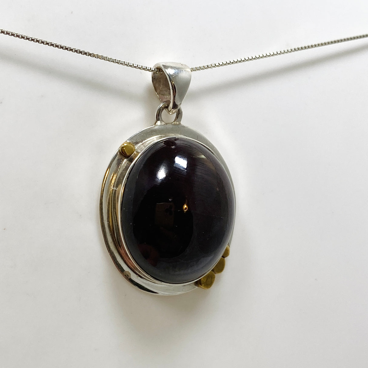 Star Garnet Oval Cabochon Pendant in a Decorative Setting KPGJ4848