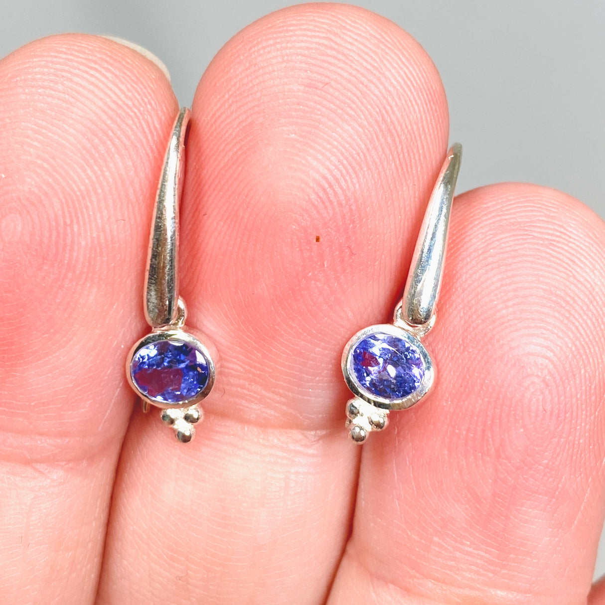 Tanzanite Oval Cabochon Earrings in a decorative settings PEGJ183