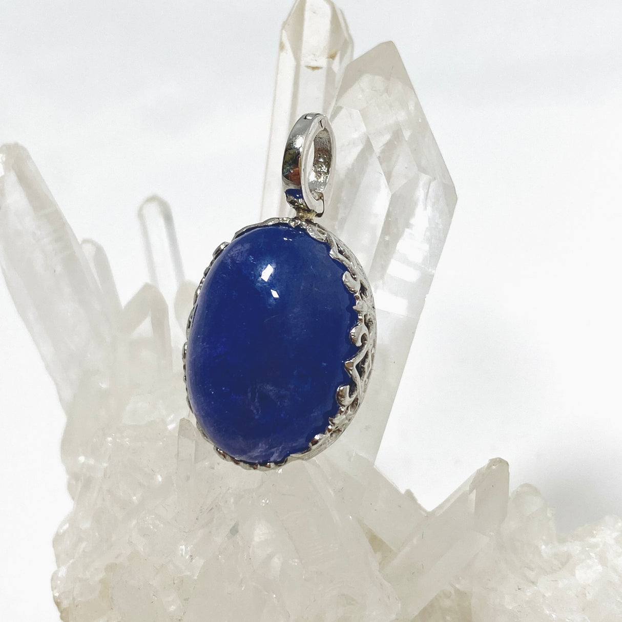 Tanzanite Oval Cabochon Pendant in a Decorative Setting HPGJ-10