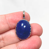 Tanzanite Oval Cabochon Pendant in a Decorative Setting HPGJ-10