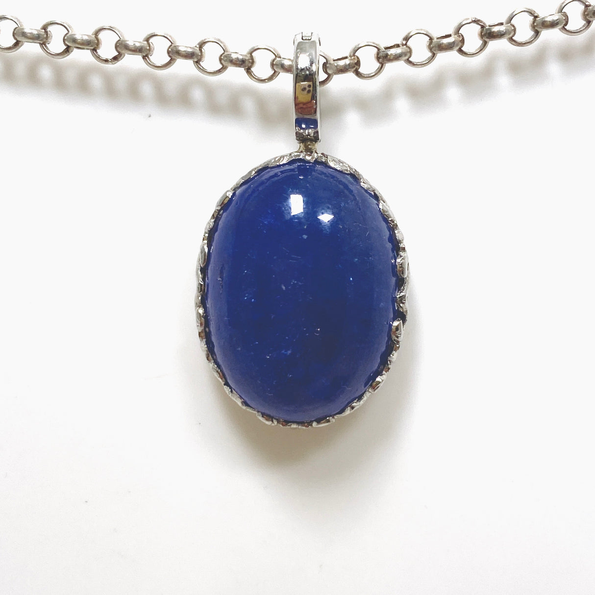 Tanzanite Oval Cabochon Pendant in a Decorative Setting HPGJ-10