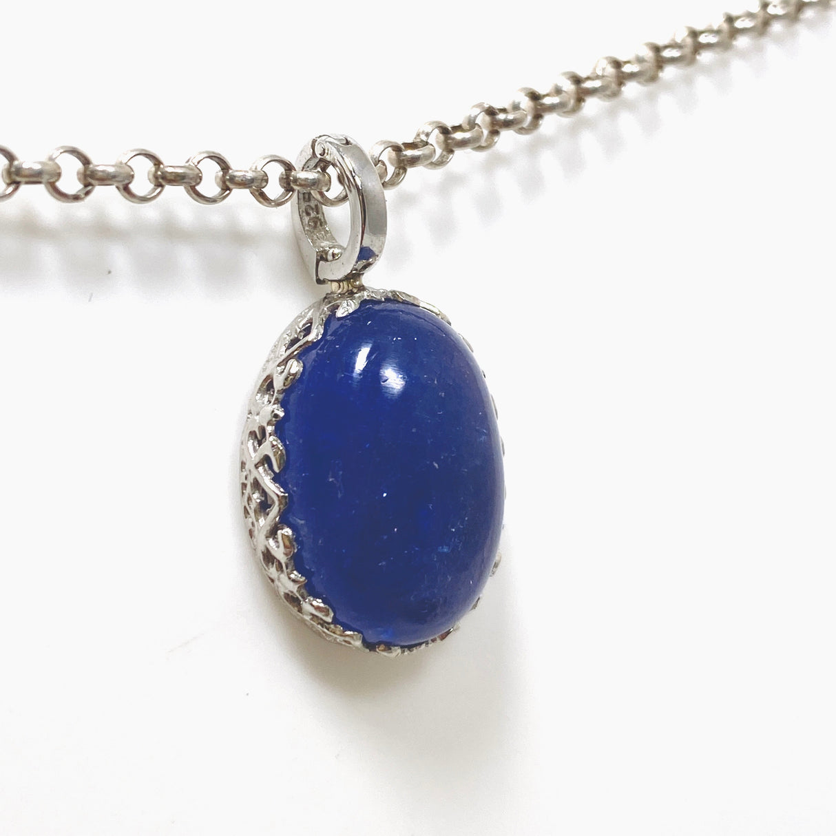 Tanzanite Oval Cabochon Pendant in a Decorative Setting HPGJ-10