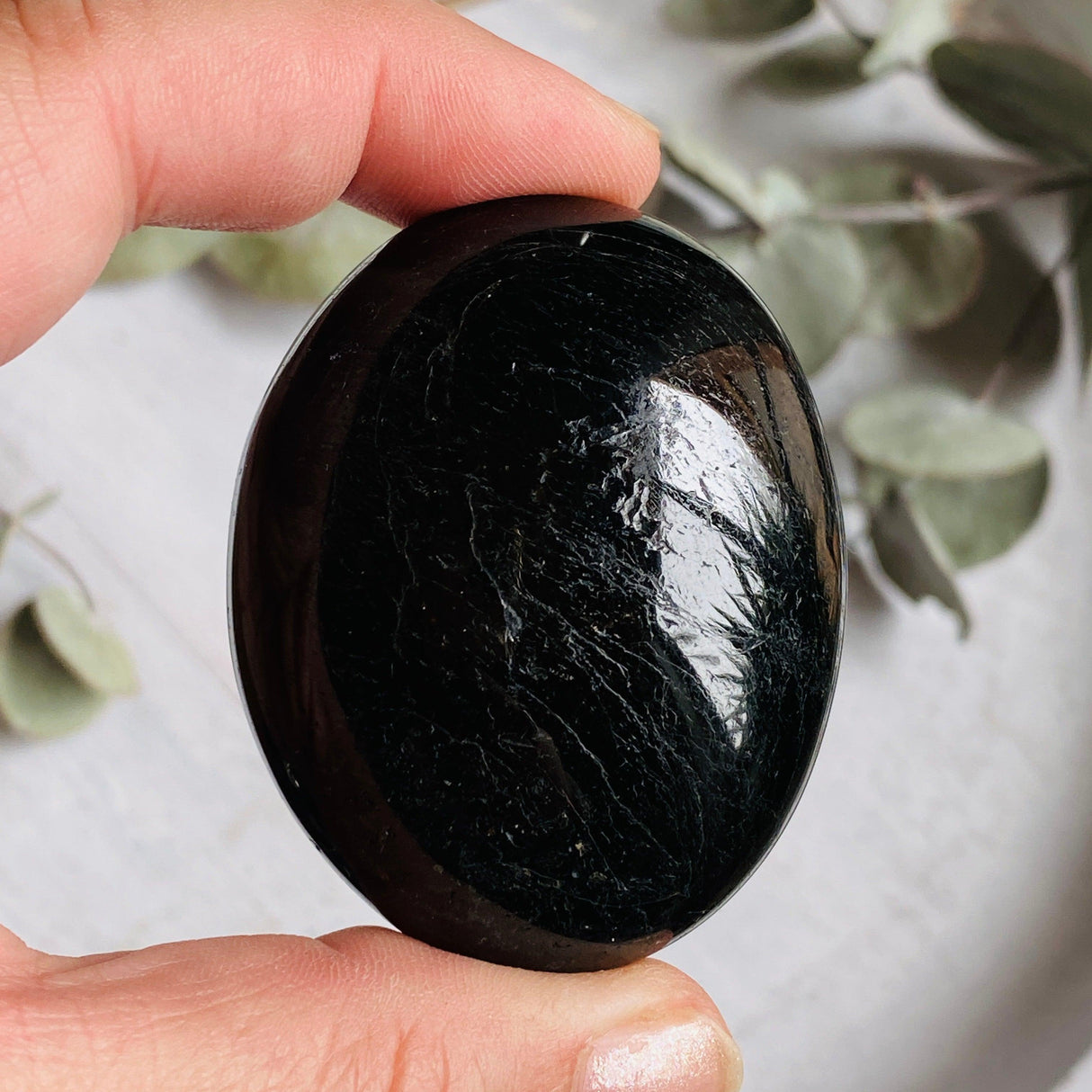 Black tourmaline palmstone 100-150g BTP-L - Nature's Magick
