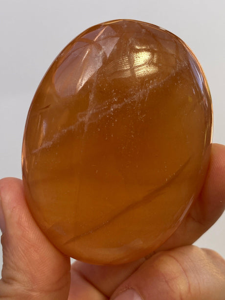 Honey Calcite Palmstone - Nature's Magick