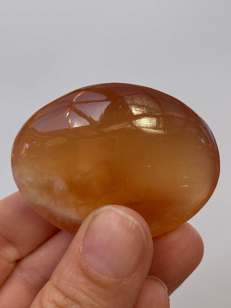 Honey Calcite Palmstone - Nature's Magick